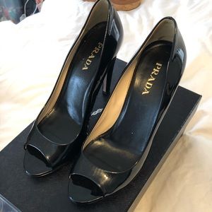 Prada black patent pumps